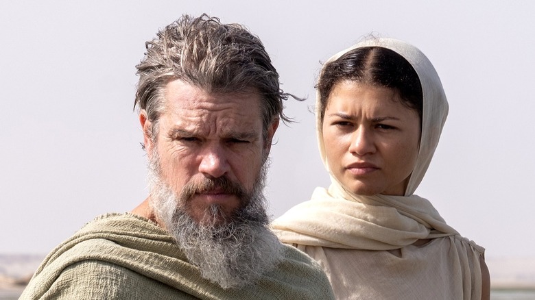Odysseus and Athena standing on a beach in The Odyssey (2026)