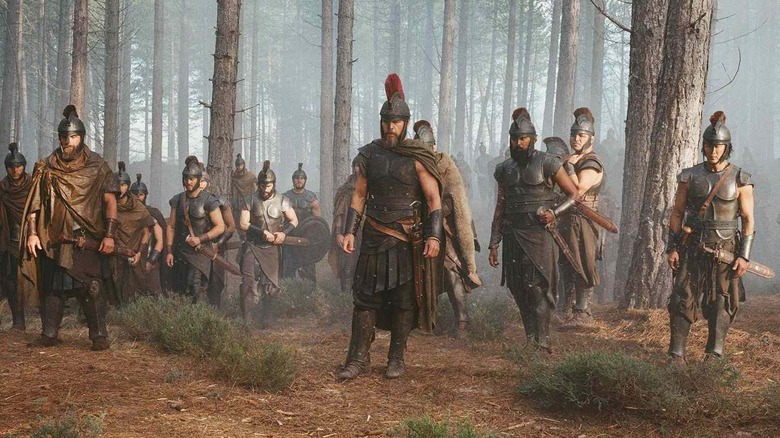 Odysseus and his men standing in the woods in The Odyssey