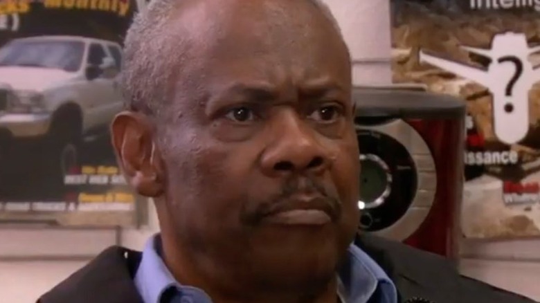 Hugh Dane as Hank the security guard