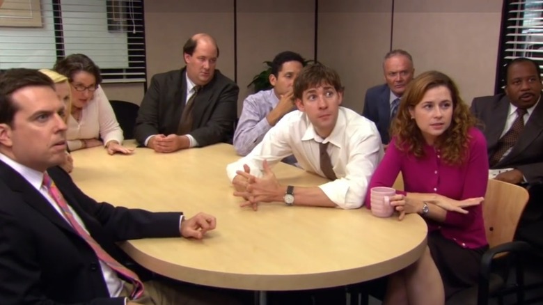The Office cast in the Dunder Mifflin conference room