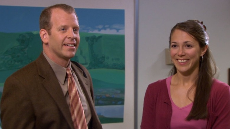Toby and Amy smiling pink shirt and sweater