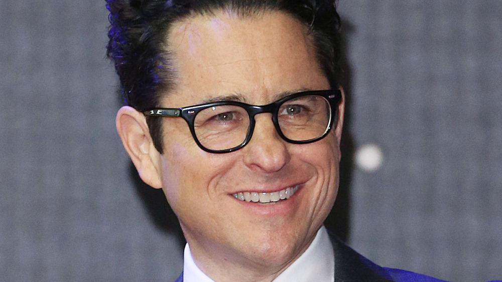 J.J. Abrams on the red carpet waving