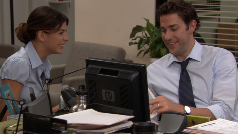 Cathy and Jim laughing in the office