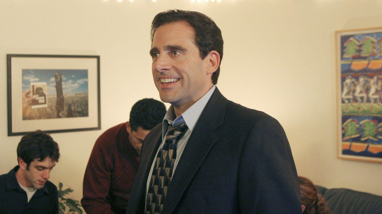 Michael Scott smiling at a party in The Office