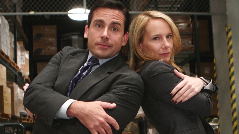 Michael and Holly posing after their rap performance in the warehouse in "Weight Loss" (2008)