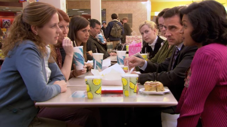 Pam, Meredith, Karen, Angela, Phyllis, and Kelly sitting and talking to Michael at the mall in "Women's Appreciation" (2007)