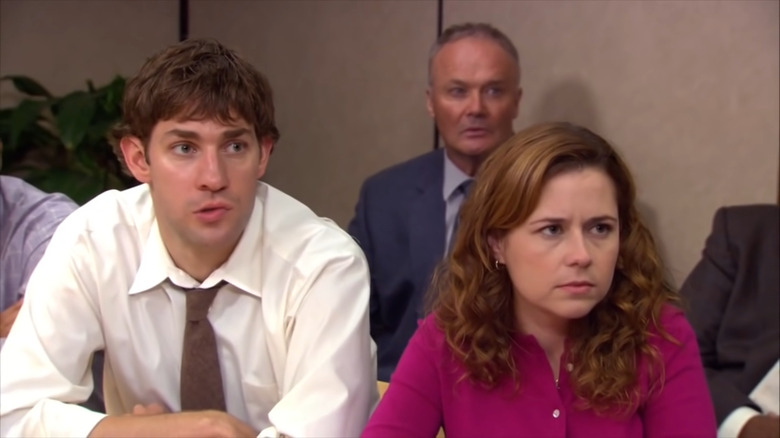 Dunder Mifflin employees in a meeting