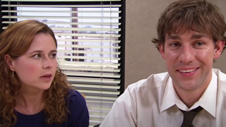 Pam looking at smiling Jim