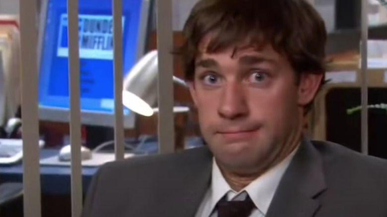 Jim stares wide-eyed at camera