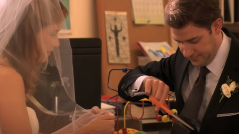Jim cuts his wedding tie