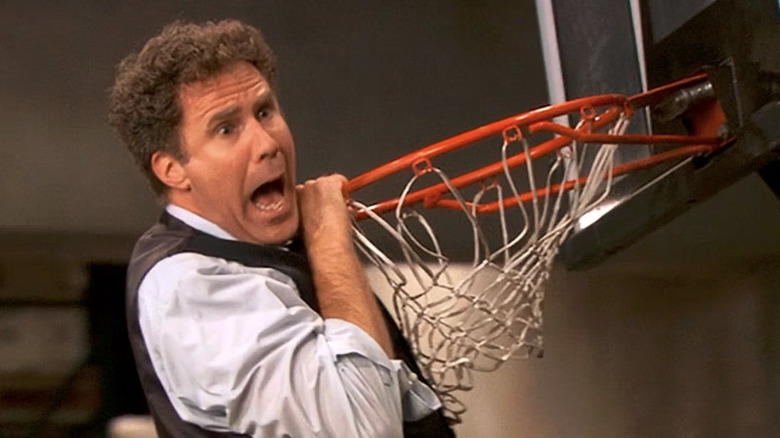 Deangelo Vickers hangs on basketball hoop