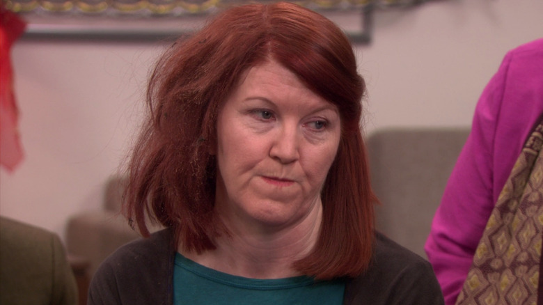 Meredith Palmer with singed hair