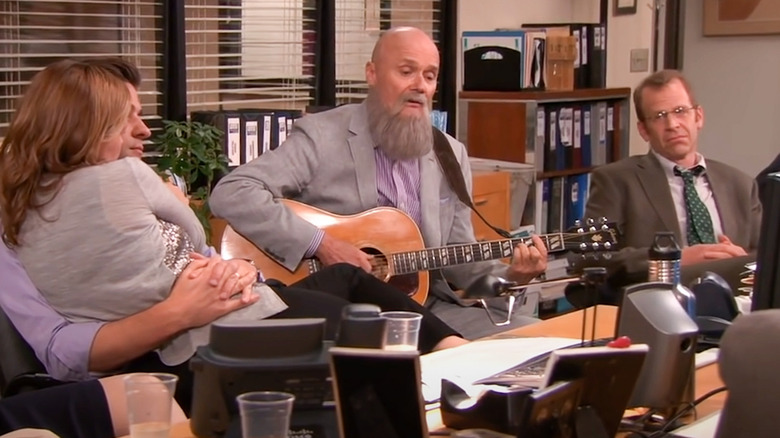 Creed playing guitar in finale