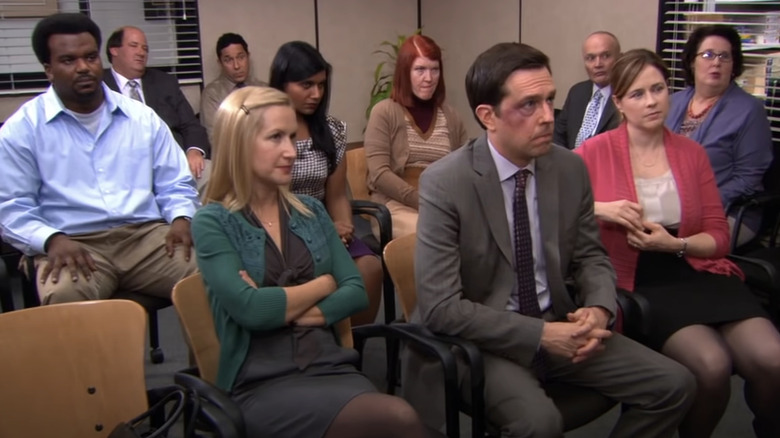 Dunder Mifflin staff at meeting