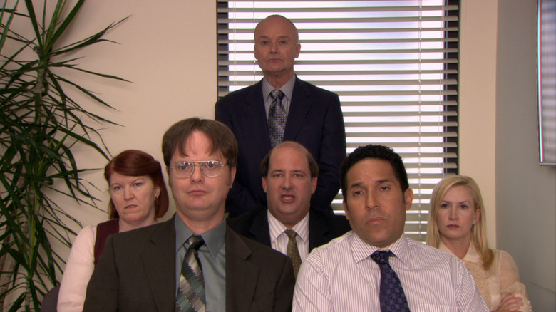 Dunder Mifflin staff talking to camera