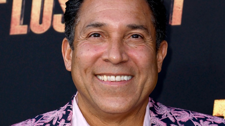 Oscar Nunez smiling