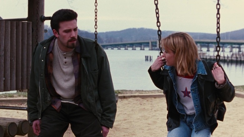 Ben Affleck and Joey Lauren Adams on swings
