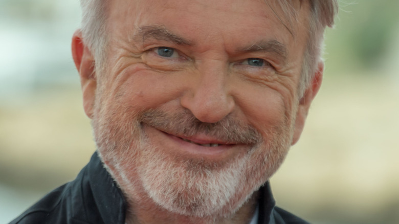 Sam Neill smiling