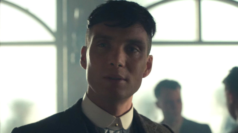 Tommy Shelby looks intrigued
