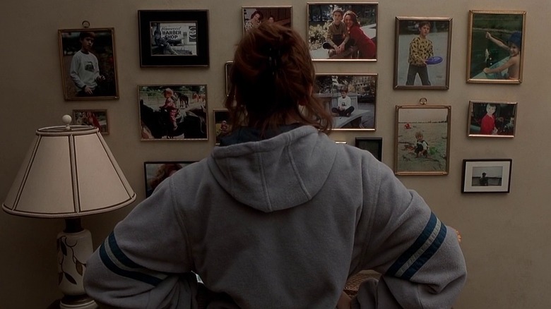 Lynn looks over family photos
