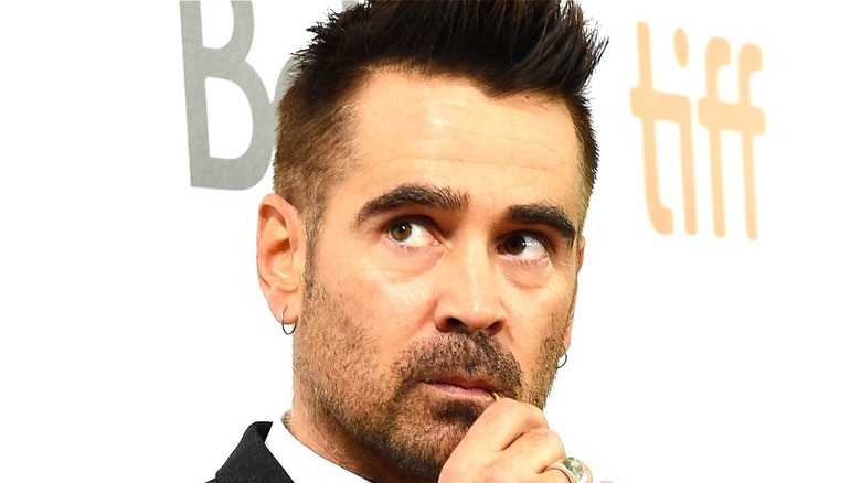 Colin Farrell chewing on a toothpick