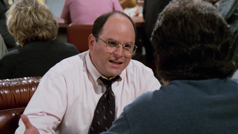 George and Jerry talk in diner