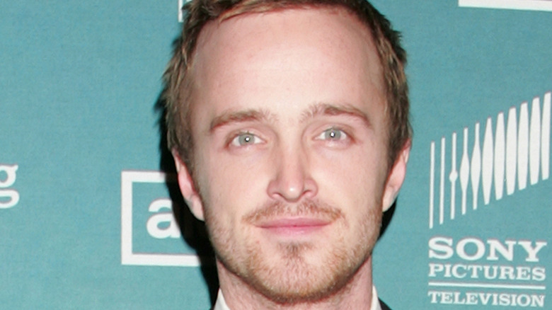 Aaron Paul at event smiling 