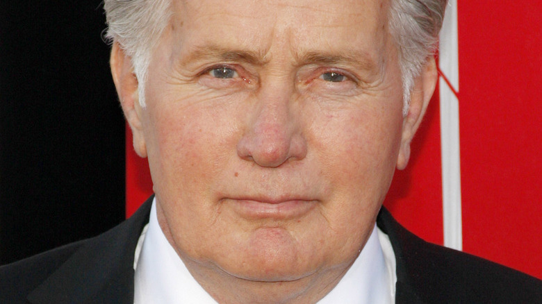 Martin Sheen wearing suit on red carpet