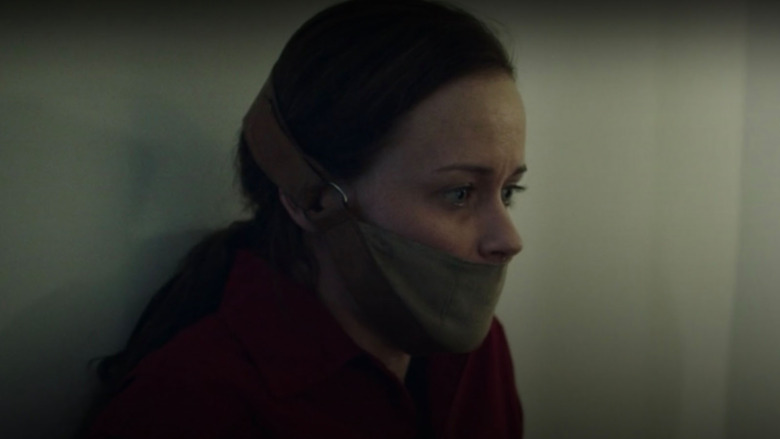 Emily with face muzzled