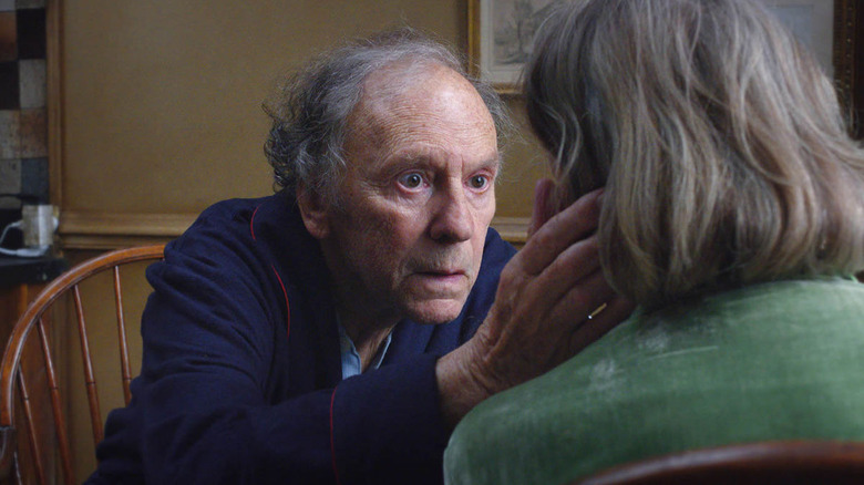 George cluthcing Anne's face in Amour (2012)