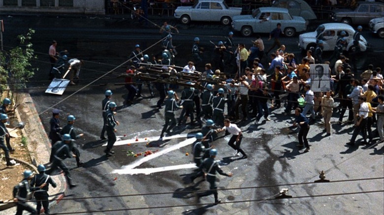 A street scene of political turmoil in Z (1969)