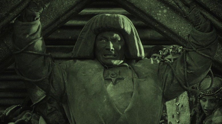 The Golem growing frustrated and violent in The Golem: How He Came Into the World (1920)