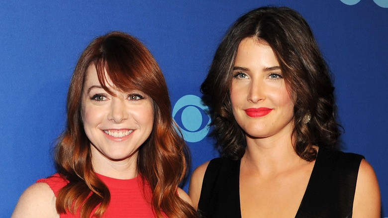 Alyson Hannigan Cobie Smulders smile on red carpet
