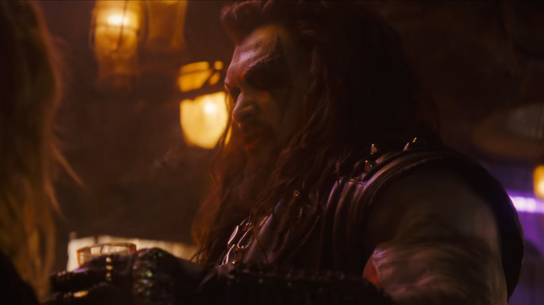 Lobo looks askance at Supergirl in "Supergirl" (2026)