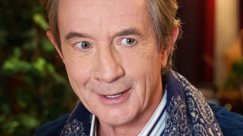 Martin short looking suspiciously to the side
