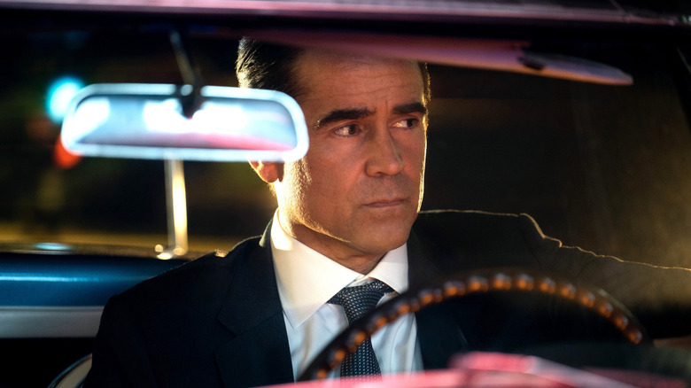 John Sugar driving a car in 
