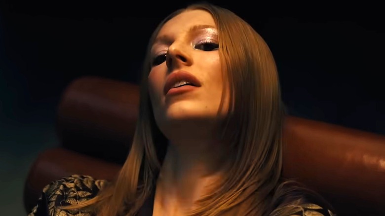 Jules Vaughn leaning back in a chair in the Euphoria Season 3 trailer