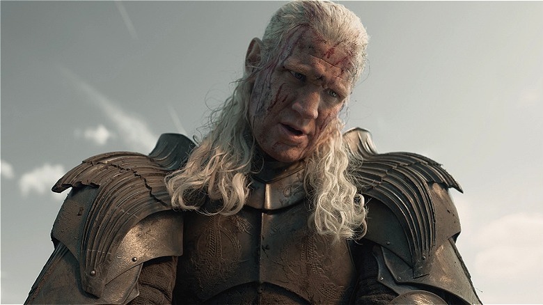 A bloodied Daemon Targaryen, clad in full battle armor, in Season 3 of "House of the Dragon" (2026)