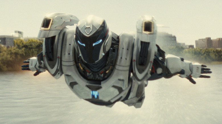 Ironheart flying over a river in 