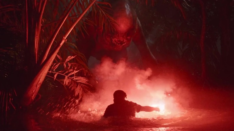 Flare illuminating mutant dinosaur in Jurassic World Rebirth