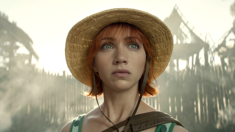 Nami wearing Monkey D. Luffy's straw hat in One Piece