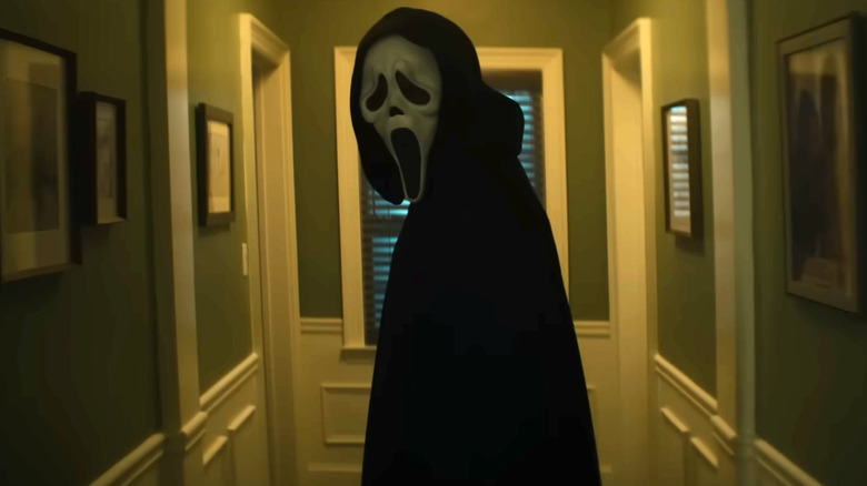 Ghostface looking over their shoulder in Scream 7