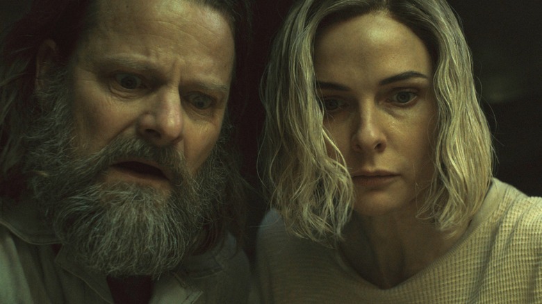 Solo and Juliette frowning in "Silo" Season 2.