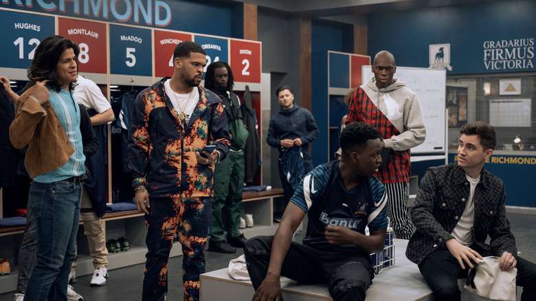Sam, Dani, Isaac, Colin, and other AFC Richmond players all talking in the locker room in Ted Lasso season 3 (2023)