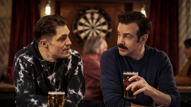 Jamie Tartt and Ted Lasso having a beer together in Ted Lasso season 2( 2021)