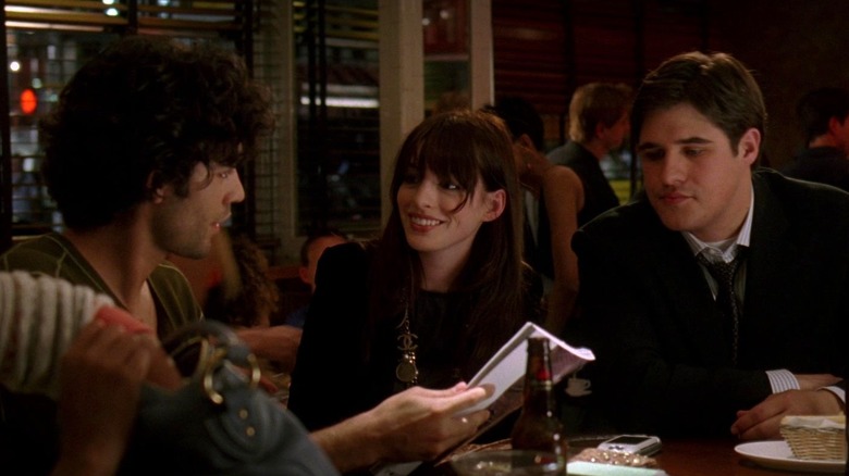 Andy Sachs smiling at Nate Cooper in The Devil Wears Prada