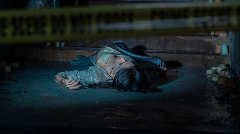 Lottie's body at the bottom of a stairwell on Yellowjackets