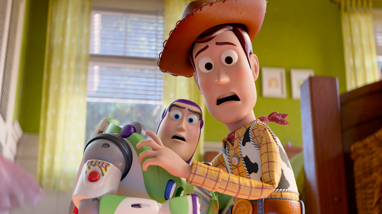 Woody and Buzz cower together in 