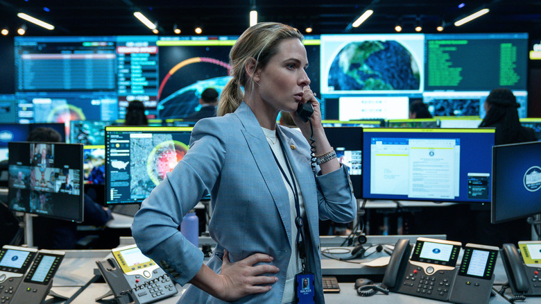 Captain Olivia Walker using the phone in 