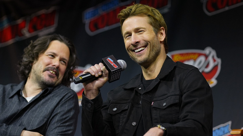 Edgar Wright and Glen Powell speak onstage during "The Running Man" New York Comic Con panel